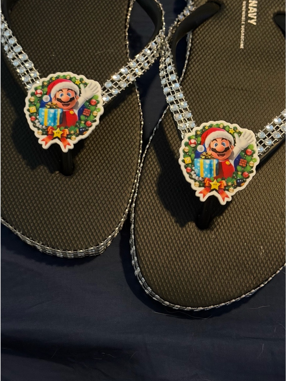 Black Glitter Flip-Flops with Festive Character Charm